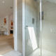 Walk in shower in a modern bathroom in kings cross apartment