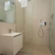Modern bathroom with walk in shower in a studio apartment in London Fitzrovia